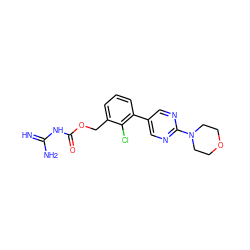 N=C(N)NC(=O)OCc1cccc(-c2cnc(N3CCOCC3)nc2)c1Cl ZINC001772608774